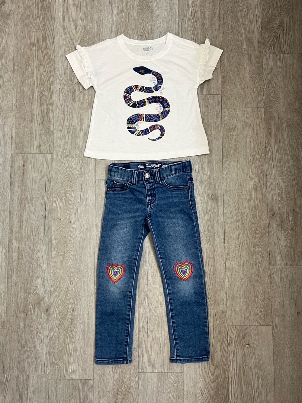 White Graphic Snake Tee with Blue Heart-Embellished Jeans